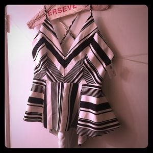 Black and white peplum cocktail top